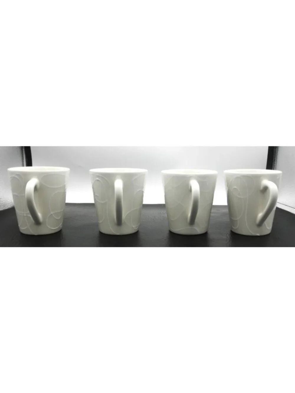 Marketplace Brand Cream Embossed Abstract Swirl Pattern 10 Ounce Mugs Set of 4 - Picture 2 of 12